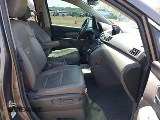 2016 Honda Odyssey SE with VIN 5FNRL5H34GB043343, listed as a IAAI auction lot 42096360 with 140,878 mi miles and . Bid and sale history available at DreamBid. Image 5.