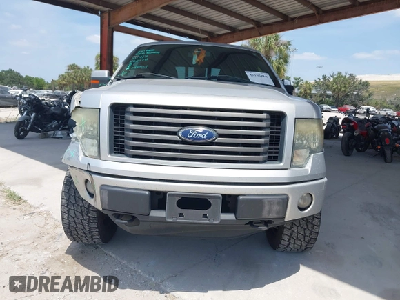 2011 Ford F-150 XL with VIN 1FTFW1EF3BFC70397, listed as a IAAI auction lot 42102868 with 149,616 mi miles. Bid and sale history available at carsss.com. Image 12.
