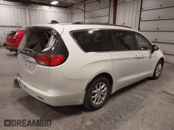 2021 Chrysler Voyager LXi with VIN 2C4RC1DG5MR508956, listed as a IAAI auction lot 41547647 with 104,563 mi miles and . Bid and sale history available at DreamBid. Image 4.