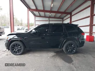 2019 Jeep Grand Cherokee Laredo E with VIN 1C4RJFAG0KC565739, listed as a IAAI auction lot 42039038 with 103,358 mi miles and . Bid and sale history available at DreamBid. Image 14.