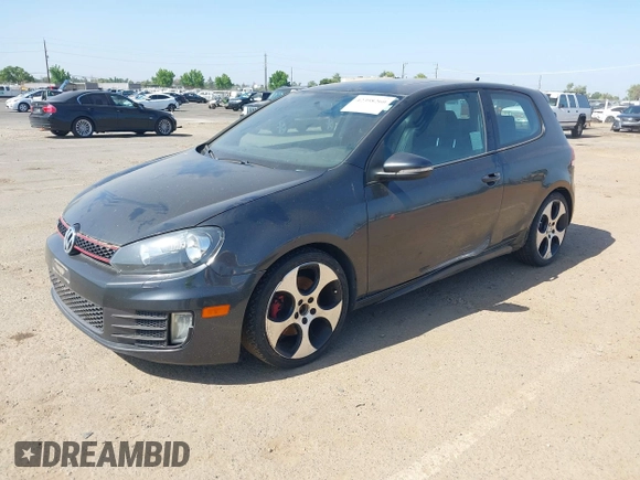 2012 Volkswagen GTI w/Conv & Sunroof z VIN WVWEV7AJ1CW261100, wystawiony jako IAAI lot #42398260 z przebiegiem 206 160 mil mil oraz . Historia ofert i sprzedaży dostępna na DreamBid. Obrazek 2.
