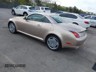 2003 Lexus SC with VIN JTHFN48Y430043403, listed as a IAAI auction lot 42057878 with 69,691 mi miles. Bid and sale history available at carsss.com. Image 3.