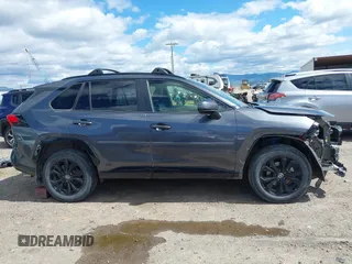 2022 Toyota RAV4 Hybrid SE with VIN JTM16RFV0ND070012, listed as a IAAI auction lot 42244604 with 22,740 mi miles and . Bid and sale history available at DreamBid. Image 14.