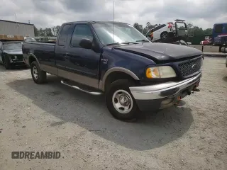 2002 Ford F-150 XL z VIN 1FTRX18L12NB86774, wystawiony jako Copart lot #59634165 z przebiegiem 262 567 mil mil oraz Szkoda całkowita • Salvage title. Historia ofert i sprzedaży dostępna na DreamBid. Obrazek 13.