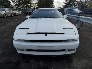 1987 Toyota Supra z VIN JT2MA70L2H0044216, wystawiony jako Copart lot #78864694 z przebiegiem 143 418 mil mil oraz Czysty tytuł • Clean title. Historia ofert i sprzedaży dostępna na DreamBid. Obrazek 5.