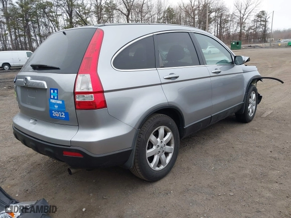 2007 Honda CR-V EX-L with VIN 5J6RE48757L017428, listed as a IAAI auction lot 41784403 with 131,388 mi miles. Bid and sale history available at carsss.com. Image 4.