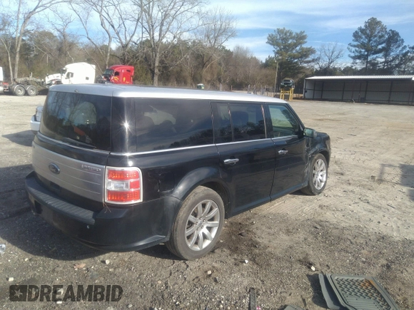 2009 Ford Flex Limited with VIN 2FMDK53C79BA25547, listed as a IAAI auction lot 41650015 with 149,821 mi miles. Bid and sale history available at carsss.com. Image 4.