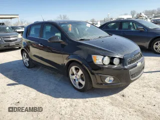 2012 Chevrolet Sonic LTZ z VIN 1G1JE6SHXC4206797, wystawiony jako Copart lot #48520535 z przebiegiem 117 350 mil mil oraz Czysty tytuł • Clean title. Historia ofert i sprzedaży dostępna na DreamBid. Obrazek 4.