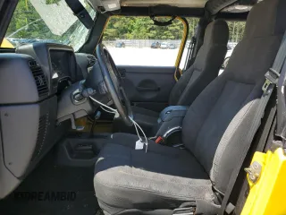 2004 Jeep Wrangler Sport with VIN 1J4FA49S84P753317, listed as a Copart auction lot 55872965 with 185,763 mi miles and Salvage title. Bid and sale history available at DreamBid. Image 7.