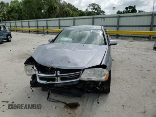 2013 Dodge Avenger SXT with VIN 1C3CDZCB4DN689363, listed as a Copart auction lot 58935055 with 141,536 mi miles and Salvage title. Bid and sale history available at DreamBid. Image 14.