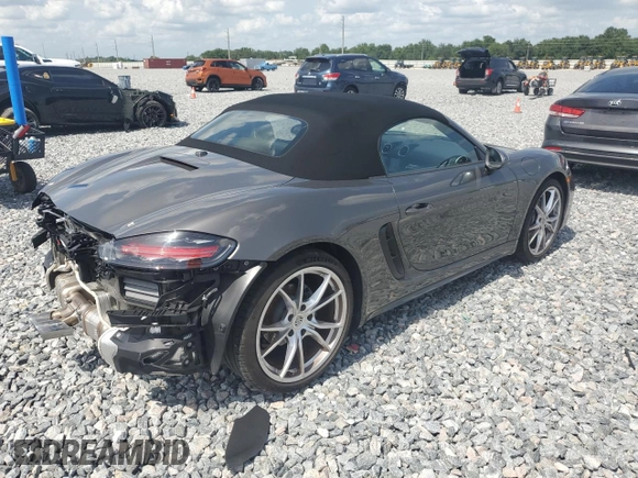 2023 Porsche Boxster with VIN WP0CA2A81PS205206, listed as a Copart auction lot 59809215 with 9,483 mi miles and Salvage title. Bid and sale history available at DreamBid. Image 3.