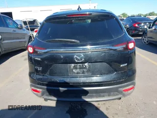 2018 Mazda CX-9 Sport with VIN JM3TCBBY6J0222750, listed as a IAAI auction lot 42294464 with 63,927 mi miles and . Bid and sale history available at DreamBid. Image 16.