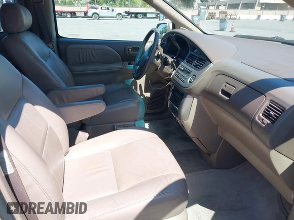 2001 Toyota Sienna LE with VIN 4T3ZF13C21U397063, listed as a IAAI auction lot 42033574 with 219,783 mi miles. Bid and sale history available at carsss.com. Image 5.