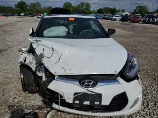 2016 Hyundai Veloster z VIN KMHTC6AD2GU272413, wystawiony jako Copart lot #55530805 z przebiegiem Nie podano mil oraz Szkoda całkowita • Salvage title. Historia ofert i sprzedaży dostępna na DreamBid. Obrazek 5.