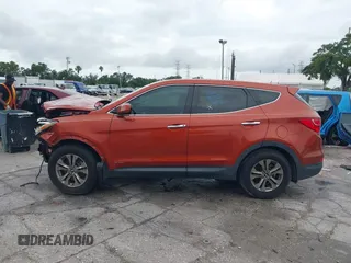 2015 Hyundai Santa Fe z VIN 5XYZT3LB7FG299504, wystawiony jako IAAI lot #42434744 z przebiegiem 104 570 mil mil oraz . Historia ofert i sprzedaży dostępna na DreamBid. Obrazek 14.