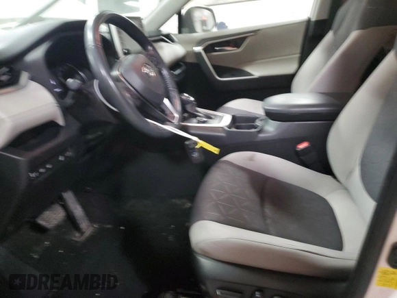 2021 Toyota RAV4 Hybrid XLE with VIN JTMRWRFV3MD127501, listed as a Copart auction lot 84239034 with 75,707 mi miles and Salvage Title. Bid and sale history available at carsss.com. Image 7.