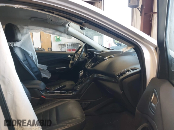 2016 Ford Escape Titanium with VIN 1FMCU9J94GUC28648, listed as a IAAI auction lot 42043761 with 82,509 mi miles and . Bid and sale history available at DreamBid. Image 5.