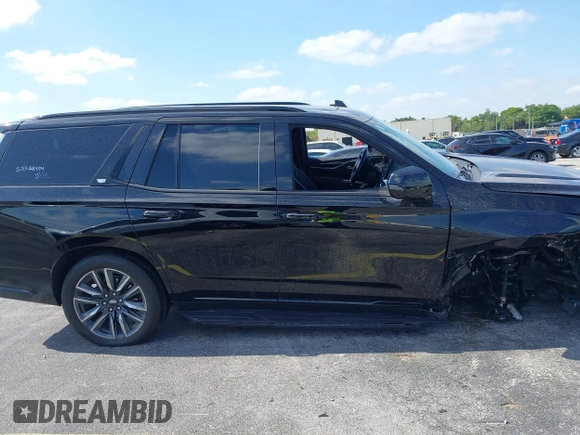 2023 Cadillac Escalade 4WD Sport z VIN 1GYS4EKLXPR513435, wystawiony jako IAAI lot #42137452 z przebiegiem 27 495 mil mil oraz . Historia ofert i sprzedaży dostępna na DreamBid. Obrazek 14.
