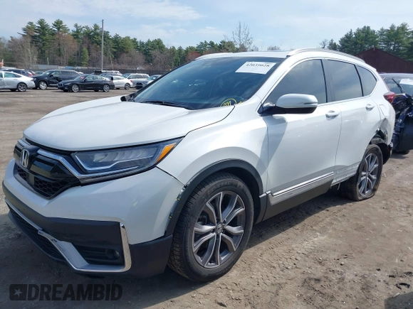 2020 Honda CR-V Touring z VIN 2HKRW2H9XLH623380, wystawiony jako IAAI lot #42039028 z przebiegiem 59 795 mil mil oraz . Historia ofert i sprzedaży dostępna na DreamBid. Obrazek 17.