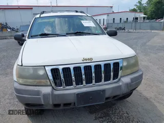 2003 Jeep Grand Cherokee Laredo with VIN 1J4GW48S73C605561, listed as a IAAI auction lot 42424407 with Not provided miles and . Bid and sale history available at DreamBid. Image 6.