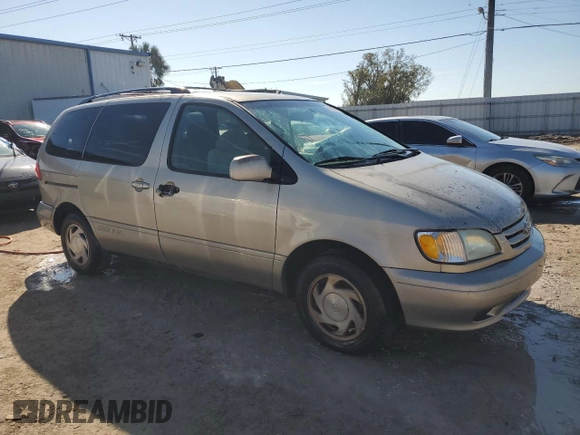 2002 Toyota Sienna LE with VIN 4T3ZF13C72U506585, listed as a Copart auction lot 77424794 with 253,337 mi miles and Clean Title. Bid and sale history available at carsss.com. Image 4.