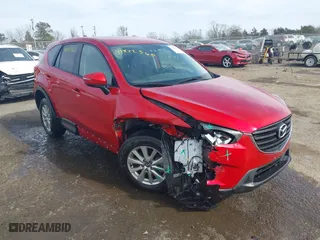 2016 Mazda CX-5 Touring with VIN JM3KE4CY9G0686494, listed as a IAAI auction lot 41822560 with 32,156 mi miles. Bid and sale history available at carsss.com. Image 1.