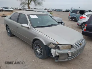 2000 Toyota Camry CE z VIN JT2BG22K9Y0453651, wystawiony jako IAAI lot #41518011 z przebiegiem 201 822 mil mil oraz . Historia ofert i sprzedaży dostępna na DreamBid. Obrazek 1.