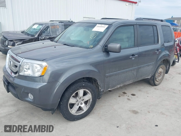 2011 Honda Pilot EX-L with VIN 5FNYF4H59BB042308, listed as a IAAI auction lot 41635511 with 196,736 mi miles and . Bid and sale history available at carsss.com. Image 17.