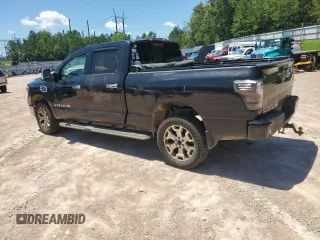 2016 Nissan Titan Platinum Reserve with VIN 1N6BA1F48GN513710, listed as a Copart auction lot 61187715 with 291,548 mi miles and Clean title. Bid and sale history available at DreamBid. Image 2.
