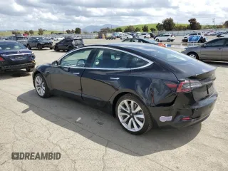 2018 Tesla Model 3 Long Range Battery with VIN 5YJ3E1EB1JF186827, listed as a Copart auction lot 51179535 with 53,649 mi miles and Salvage Title. Bid and sale history available at DreamBid. Image 2.