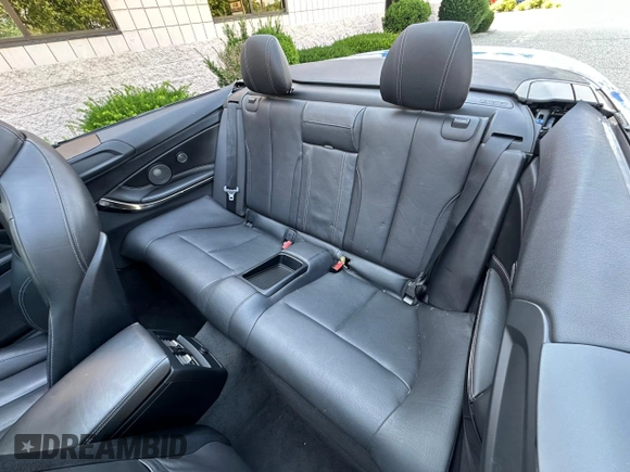 2015 BMW M4 with VIN WBS3U9C56FP967640, listed as a Copart auction lot 63641785 with 31,516 mi miles and Salvage title. Bid and sale history available at DreamBid. Image 14.