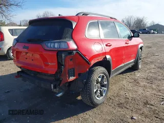 2019 Jeep Cherokee Trailhawk Elite with VIN 1C4PJMBX3KD217437, listed as a IAAI auction lot 41448614 with 85,889 mi miles. Bid and sale history available at carsss.com. Image 4.
