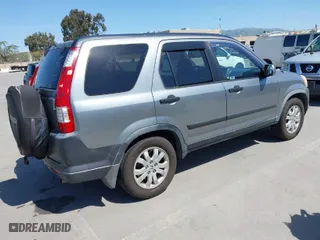 2006 Honda CR-V EX with VIN JHLRD68816C025041, listed as a IAAI auction lot 41963589 with 180,077 mi miles. Bid and sale history available at carsss.com. Image 4.