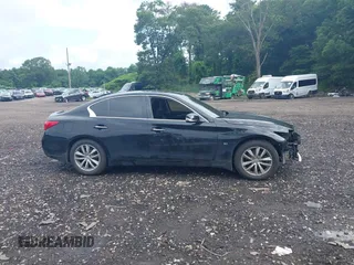 2015 Infiniti Q50 Premium with VIN JN1BV7AR8FM407956, listed as a IAAI auction lot 42724981 with 99,507 mi miles and . Bid and sale history available at DreamBid. Image 12.