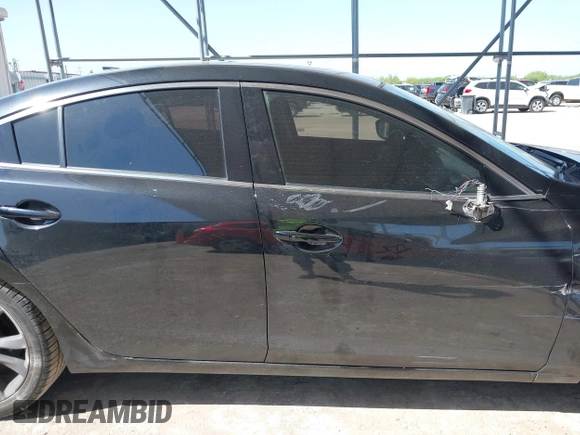 2015 Mazda 6 i Grand Touring with VIN JM1GJ1W59F1179548, listed as a IAAI auction lot 42004860 with 153,532 mi miles and . Bid and sale history available at DreamBid. Image 14.