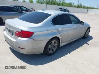 2013 BMW 5 Series 528i with VIN WBAXG5C57DD229608, listed as a IAAI auction lot 41999493 with 147,003 mi miles and . Bid and sale history available at carsss.com. Image 4.