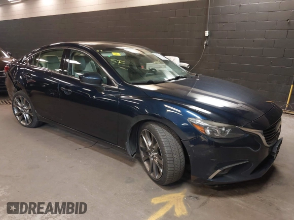 2017 Mazda 6 Grand Touring with VIN JM1GL1W51H1101519, listed as a IAAI auction lot 42132215 with 145,796 mi miles. Bid and sale history available at carsss.com. Image 1.
