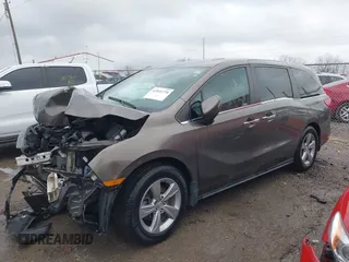 2018 Honda Odyssey EX-L with VIN 5FNRL6H72JB081086, listed as a IAAI auction lot 41031370 with 73,907 mi miles and . Bid and sale history available at DreamBid. Image 17.