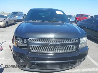 2013 Chevrolet Tahoe LT z VIN 1GNSCBE03DR174545, wystawiony jako IAAI lot #42510886 z przebiegiem 184 627 mil mil oraz . Historia ofert i sprzedaży dostępna na DreamBid. Obrazek 12.