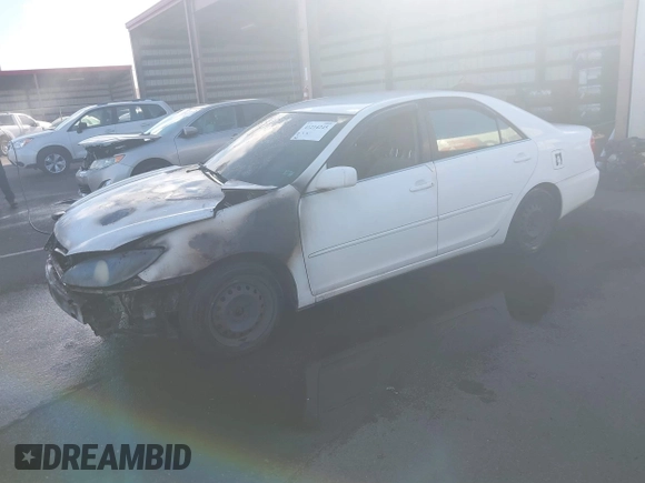 2002 Toyota Camry LE z VIN JTDBE32K120093737, wystawiony jako IAAI lot #41214245 z przebiegiem Nie podano mil oraz . Historia ofert i sprzedaży dostępna na DreamBid. Obrazek 2.