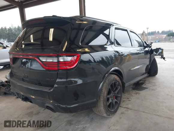 2023 Dodge Durango SRT 392 Premium with VIN 1C4SDJGJ6PC592871, listed as a IAAI auction lot 41740993 with 9,028 mi miles and . Bid and sale history available at DreamBid. Image 4.