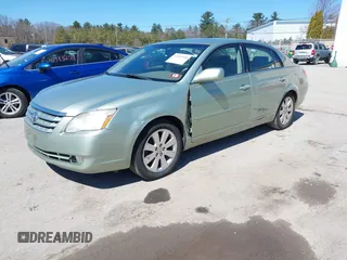 2007 Toyota Avalon XL with VIN 4T1BK36B27U177466, listed as a IAAI auction lot 42006940 with 202,095 mi miles. Bid and sale history available at carsss.com. Image 2.