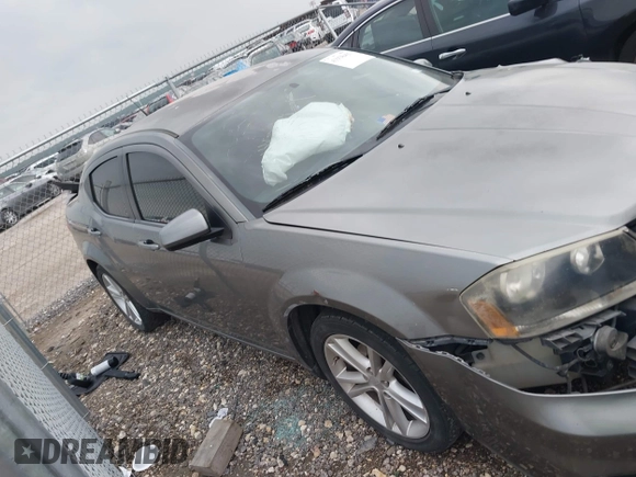 2013 Dodge Avenger SXT with VIN 1C3CDZCB1DN576762, listed as a IAAI auction lot 41938493 with 168,149 mi miles and . Bid and sale history available at carsss.com. Image 13.