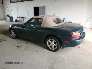 1999 Mazda MX-5 Miata z VIN JM1NB353XX0111850, wystawiony jako Copart lot #53076805 z przebiegiem 128 707 mil mil oraz Szkoda całkowita • Salvage title. Historia ofert i sprzedaży dostępna na DreamBid. Obrazek 2.