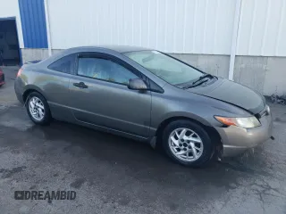 2006 Honda Civic Cpe DX with VIN 2HGFG12276H000805, listed as a Copart auction lot 71200794 with 309,041 mi miles and Salvage Title. Bid and sale history available at carsss.com. Image 4.