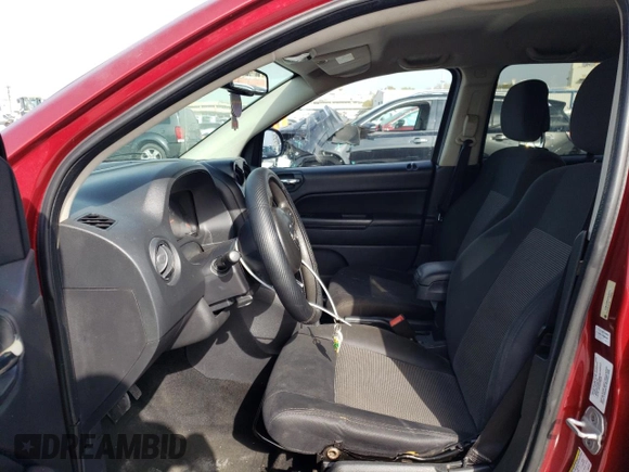 2012 Jeep Compass Sport with VIN 1C4NJCBA5CD678721, listed as a Copart auction lot 50605465 with 204,527 mi miles and Salvage Title. Bid and sale history available at carsss.com. Image 7.