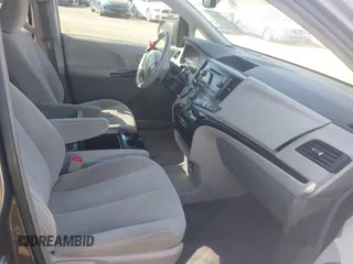 2014 Toyota Sienna LE AAS with VIN 5TDKK3DC0ES498732, listed as a IAAI auction lot 42077044 with 189,745 mi miles and . Bid and sale history available at carsss.com. Image 5.