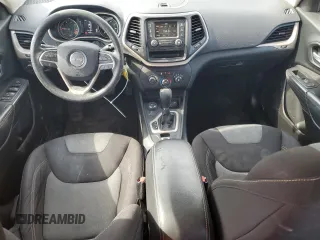 2015 Jeep Cherokee Sport with VIN 1C4PJMAB3FW615621, listed as a Copart auction lot 52330115 with 160,739 mi miles and Salvage title. Bid and sale history available at DreamBid. Image 8.