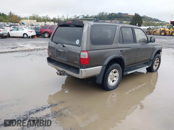 1998 Toyota 4Runner SR5 with VIN JT3HN86R1W0168185, listed as a IAAI auction lot 41936469 with 243,983 mi miles and . Bid and sale history available at DreamBid. Image 4.