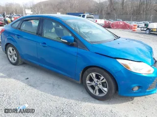 2014 Ford Focus SE with VIN 1FADP3F22EL104606, listed as a IAAI auction lot 41784038 with 99,173 mi miles. Bid and sale history available at carsss.com. Image 1.